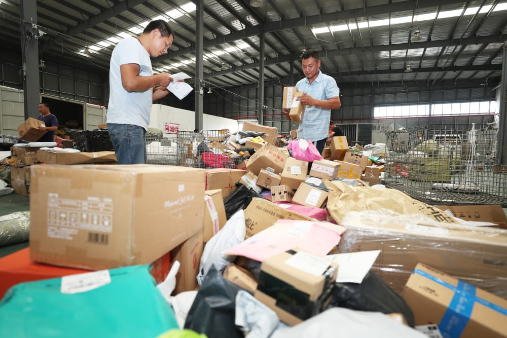 海量快递包装怎么办?全国政协常委周汉民建议加大回收利用力度